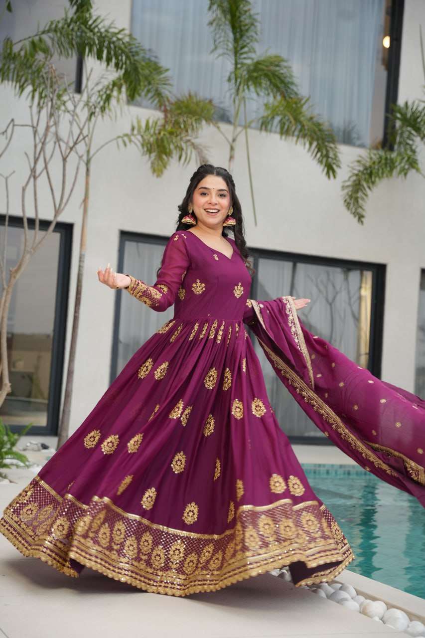 Women’s Ethnic Anarkali Style Floor-Length Gown in Magenta with Golden Zari Embroidery – Festive & Wedding Wear